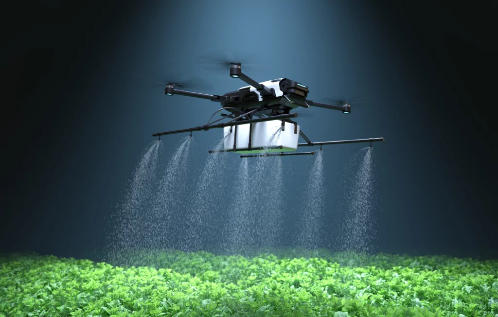 Free photo drone spraying fertilizer on vegetable green plants agriculture technology farm automation.